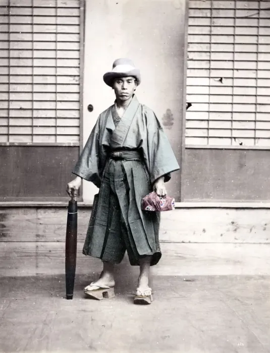 Framed Print : Japanese man in outdoor shoes and with umbrella, Japan Framed Print : Japanese man in outdoor shoes and with umbrella, Japan