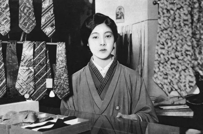 Framed Print : A Japanese sales assistant Framed Print : A Japanese sales assistant