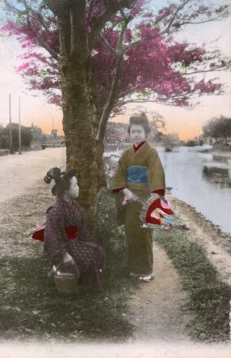 Framed Print : Two Japanese women by the side of a canal / river - Japan Framed Print : Two Japanese women by the side of a canal / river - Japan
