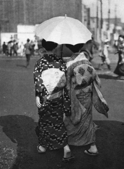 Framed Print : Two Japanese women walk holding a parasol Framed Print : Two Japanese women walk holding a parasol
