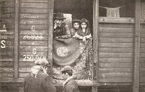 Jewish family camping inside a railway wagon