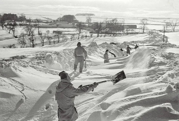 Framed Print : John (at front) clearing the snow in Yorkshire as part of the community work that is done by Polish Forces staying at the Helmsley Polish Resettlement Camp Date: 1947 - 1948 Framed Print : John (at front) clearing the snow in Yorkshire as part of the community work that is done by Polish Forces staying at the Helmsley Polish Resettlement Camp Date: 1947 - 1948