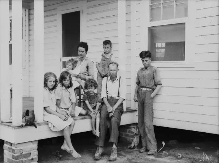Framed Print : John Bunyan Locklear and family on porch of new home. Pembro