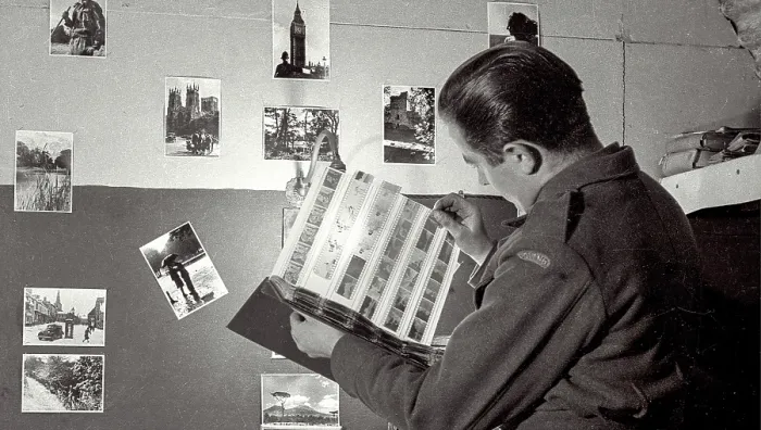 Framed Print : John closely examining negatives in the darkroom where he was able to hone his skills as part of his time at the Polish Resettlement Camp in Helmsley, Yorkshire Framed Print : John closely examining negatives in the darkroom where he was able to hone his skills as part of his time at the Polish Resettlement Camp in Helmsley, Yorkshire
