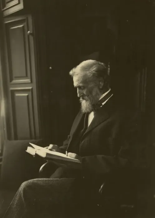 Framed Print : John Muir, seated, reading a book Framed Print : John Muir, seated, reading a book