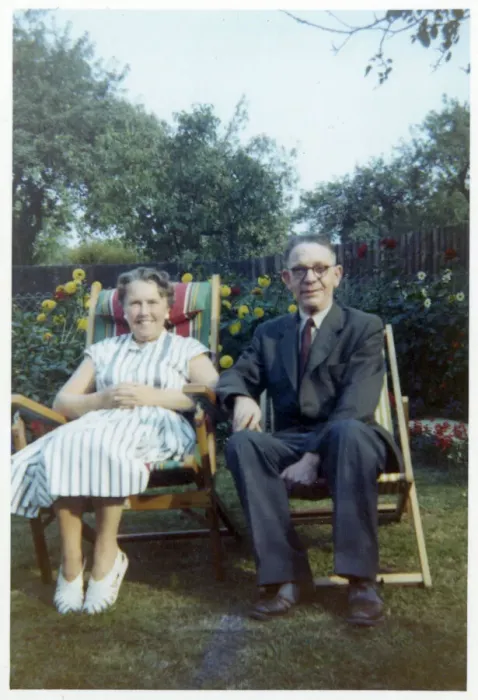 Framed Print : A jolly older couple in a neat suburban back garden Framed Print : A jolly older couple in a neat suburban back garden