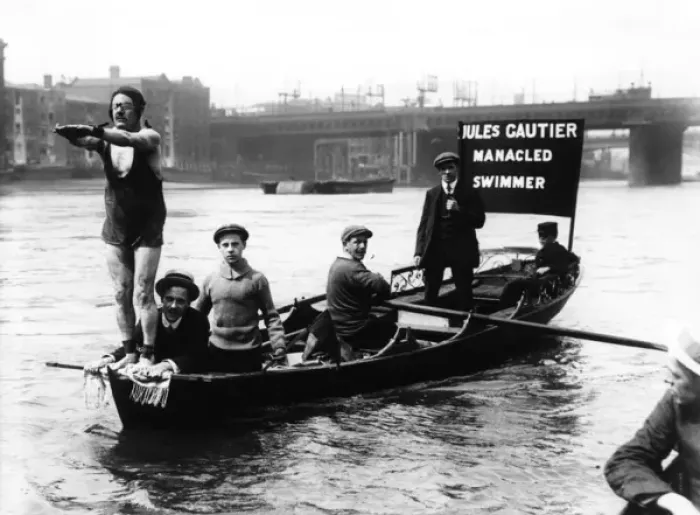 Framed Print : Jules Gautier, stunt swimmer, with boat crew Framed Print : Jules Gautier, stunt swimmer, with boat crew