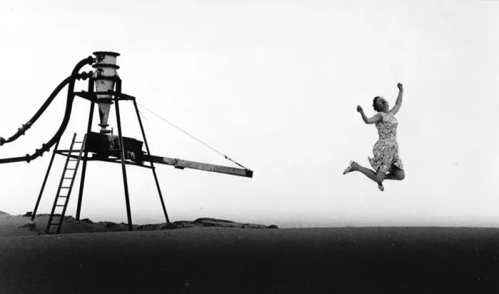 Framed Print : Jumping woman at a gravel pit Framed Print : Jumping woman at a gravel pit