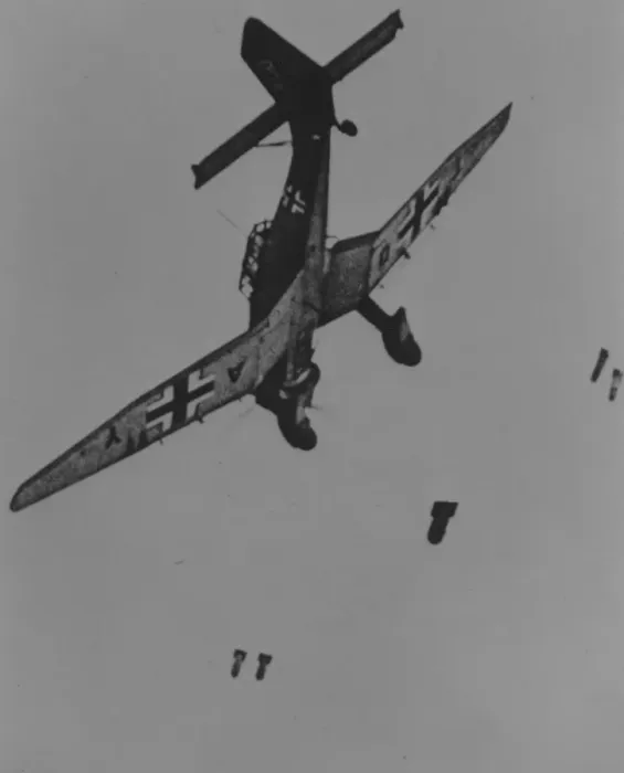 Framed Print : Junkers Ju 87B -releases its bombs from low level with Framed Print : Junkers Ju 87B -releases its bombs from low level with
