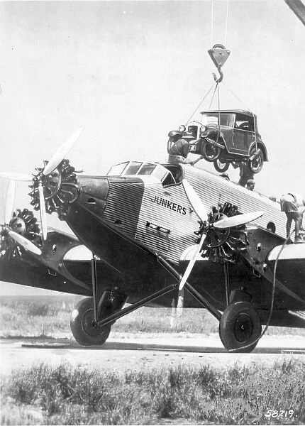 Junkers Ju52  /  3m being loaded with a car