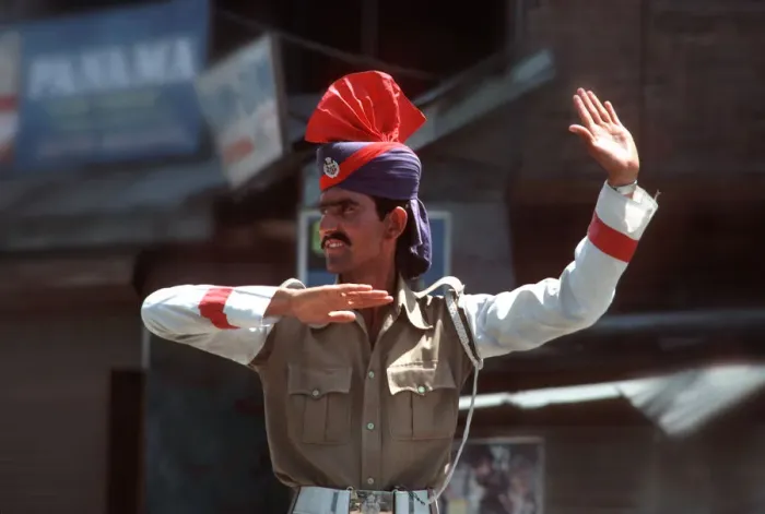 Framed Print : Kashmiri policeman on traffic duty in Srinagar, Kashmir Framed Print : Kashmiri policeman on traffic duty in Srinagar, Kashmir