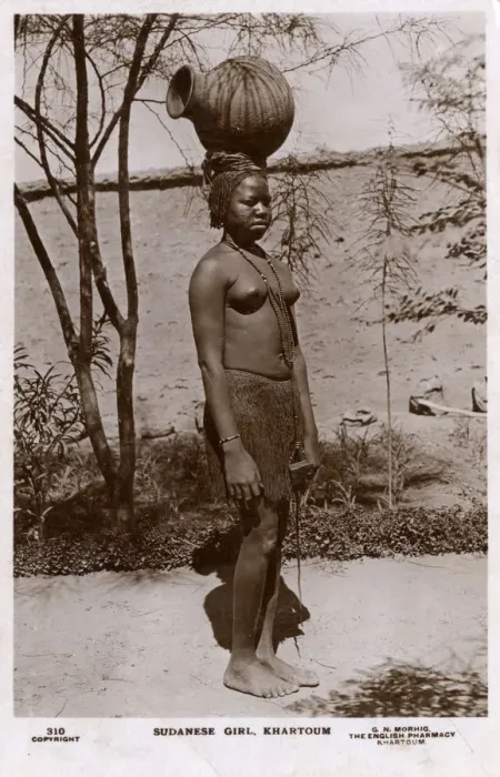 Framed Print : Khartoum, Sudan, Africa - Sudanese girl carrying a water pot Framed Print : Khartoum, Sudan, Africa - Sudanese girl carrying a water pot
