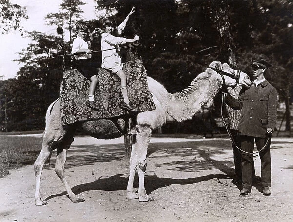KIDS ON A CAMEL RIDE