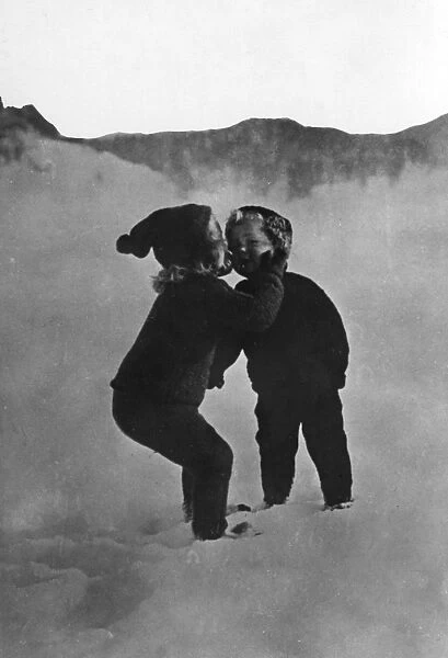 Kids Kissing in the Snow