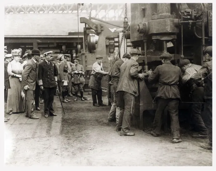 Framed Print : King George V (1865-1936) and Queen Mary (1867-1953) visit a factory workshop during Framed Print : King George V (1865-1936) and Queen Mary (1867-1953) visit a factory workshop during