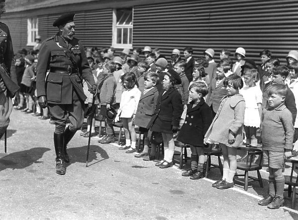 King George V, inspecting a group of children