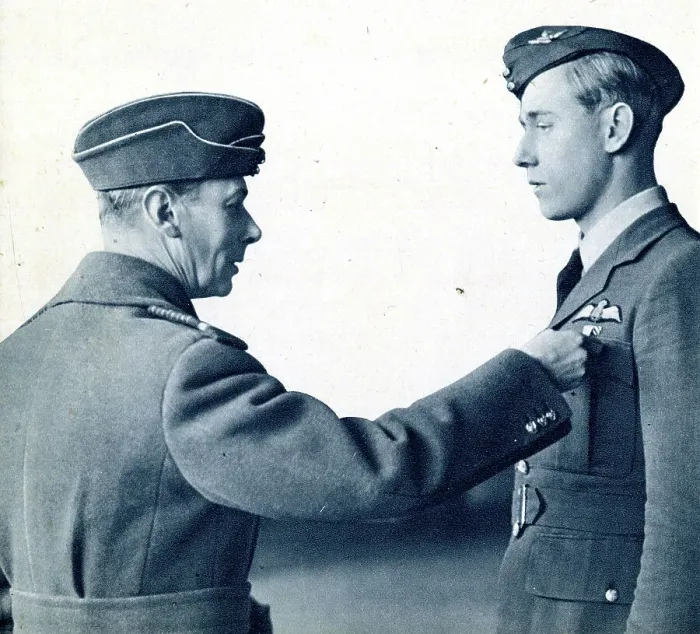 Framed Print : King George VI pins DFC on pilot officer, WW2 Framed Print : King George VI pins DFC on pilot officer, WW2