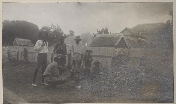 Kingston scouts painting fence, Jamaica