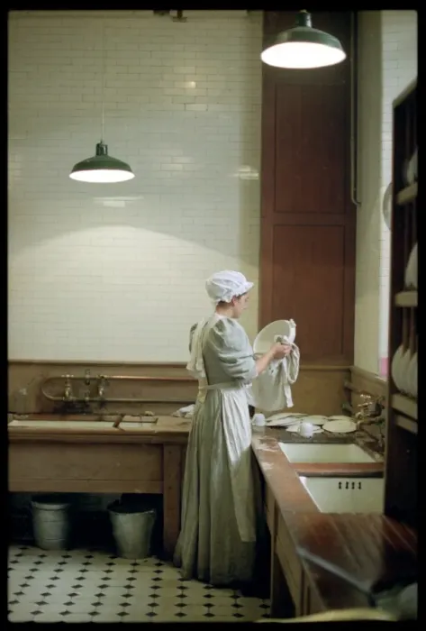 Framed Print : Kitchenmaid in Kitchen Framed Print : Kitchenmaid in Kitchen