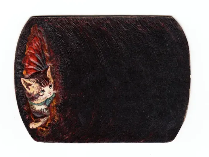 Framed Print : Kitten inside a muff on a cutout greetings card Framed Print : Kitten inside a muff on a cutout greetings card