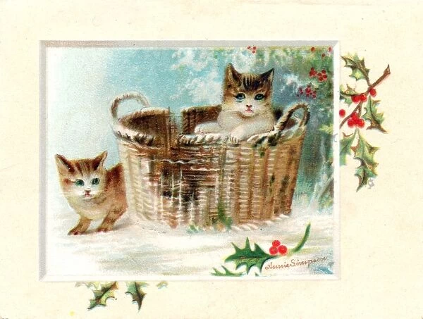 Two kittens with basket on a Christmas card
