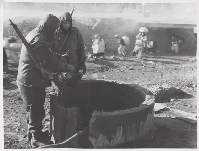 Framed Print : Korean War - two soldiers at well Framed Print : Korean War - two soldiers at well