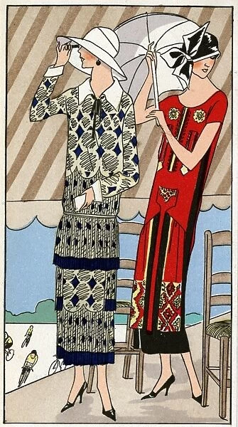 Two ladies in outfits by Lucien Lelong and Jean Patou