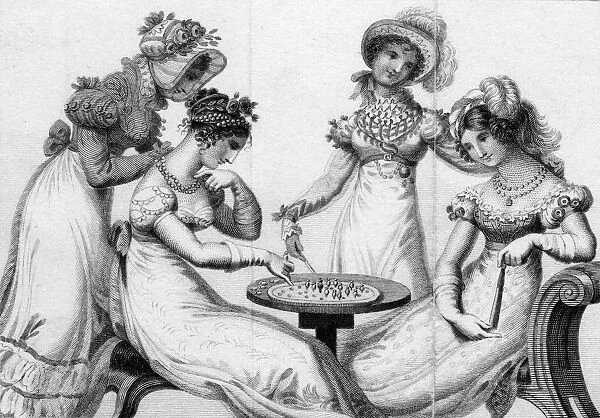 LADIES PLAYING SOLITAIRE