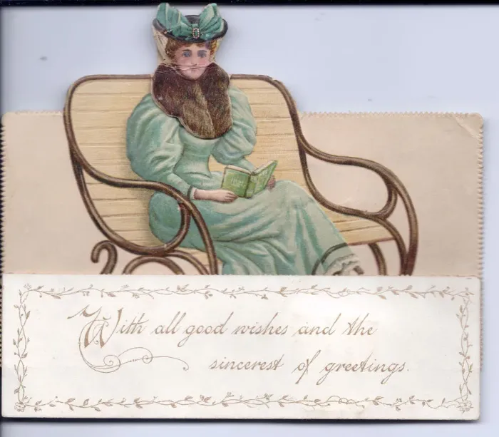 Framed Print : Lady on a bench reading a book on a cutout greetings card Framed Print : Lady on a bench reading a book on a cutout greetings card