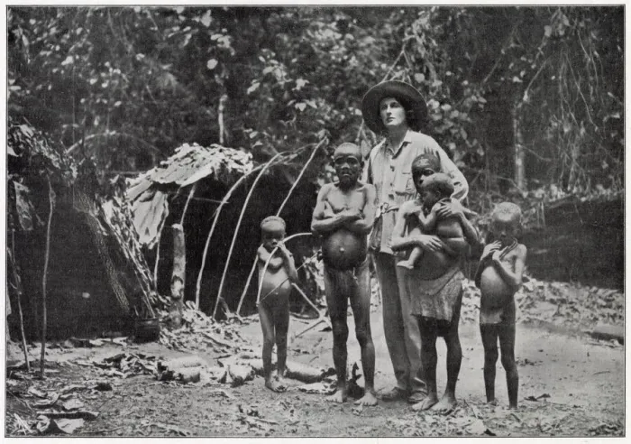 Framed Print : Lady Broughton, travelling in southern Africa, poses with a family of pygmies Framed Print : Lady Broughton, travelling in southern Africa, poses with a family of pygmies