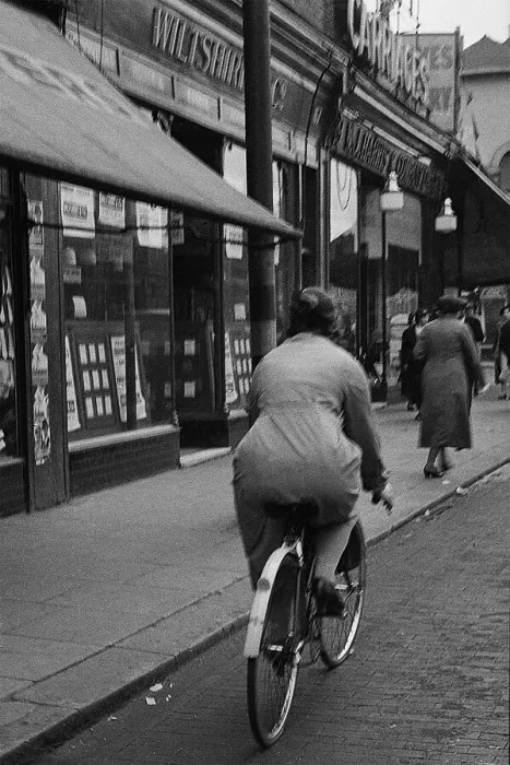 Framed Print : Lady cyclist, Lee High Road, SE London Framed Print : Lady cyclist, Lee High Road, SE London