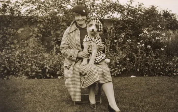 Framed Print : Lady with dog in fancy dress Framed Print : Lady with dog in fancy dress