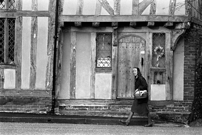 Framed Print : Lady in headscarf, Lavenham, Suffolk, England