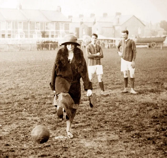 Framed Print : A lady kicking a football, early 1900s Framed Print : A lady kicking a football, early 1900s