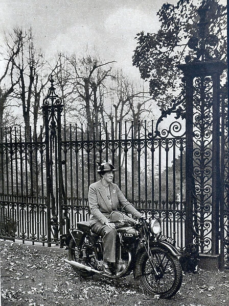 Lady Leconfield on a motorbike