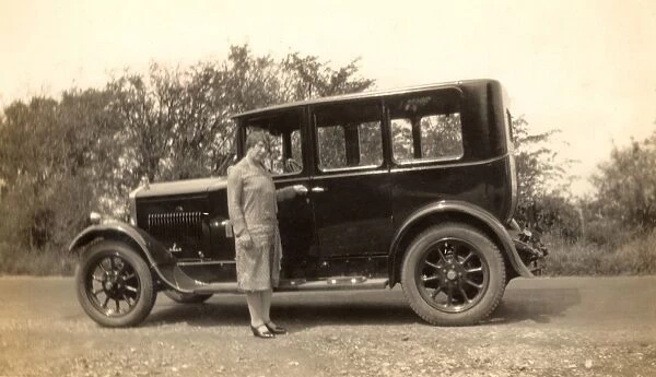 Lady and motor car