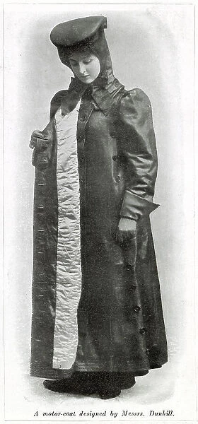 Lady motorist wearing a quilted full length protective motor-coat against the bad weather designed by Dunhill. Date: 1907