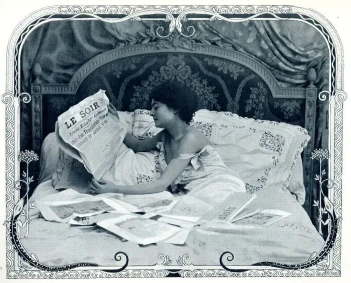 Framed Print : Lady reading the newspaper in bed Framed Print : Lady reading the newspaper in bed