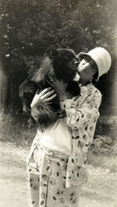 Framed Print : Lady in Toronto, Ontario, Canada posing with a bear cub Framed Print : Lady in Toronto, Ontario, Canada posing with a bear cub