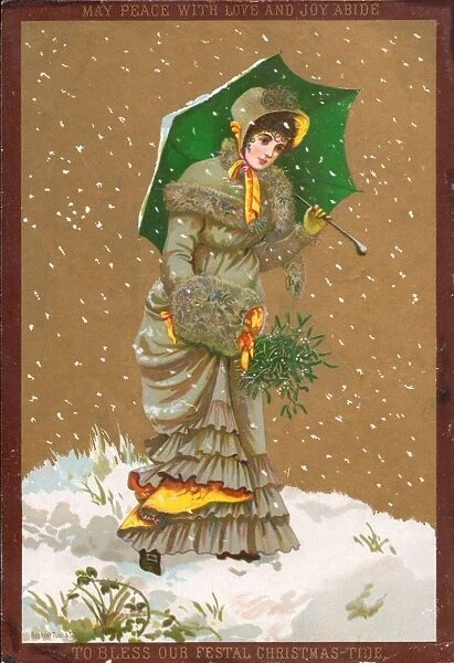 Lady walking through the snow on a Christmas card