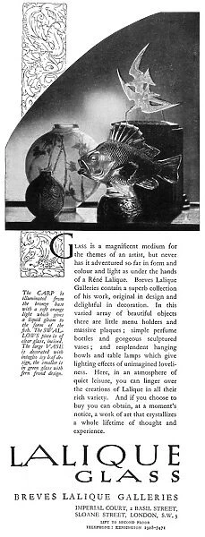 A Lalique Glass advertisement featuring a glass carp