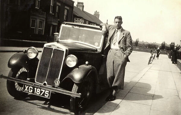 Lanchester car. A Lanchester car (10 HP) and suave-looking driver in relaxed