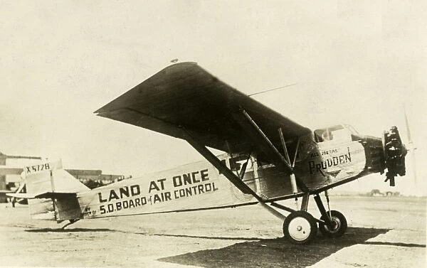LAND AT ONCE. An aeroplane (probably a Fairchild) of the U.S