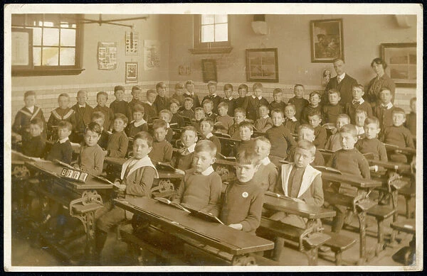 Large classroom of boys with two teachers