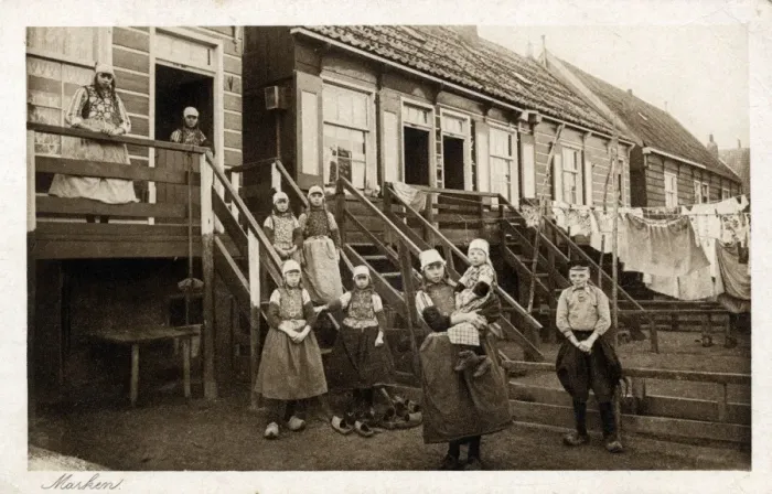 Framed Print : Large dutch family outside their wooden home at Marken Framed Print : Large dutch family outside their wooden home at Marken