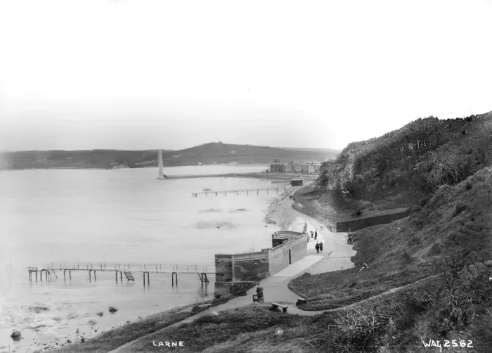 Framed Print : Larne - an elevated view looking down on the coastal walk with the bathing piers Framed Print : Larne - an elevated view looking down on the coastal walk with the bathing piers