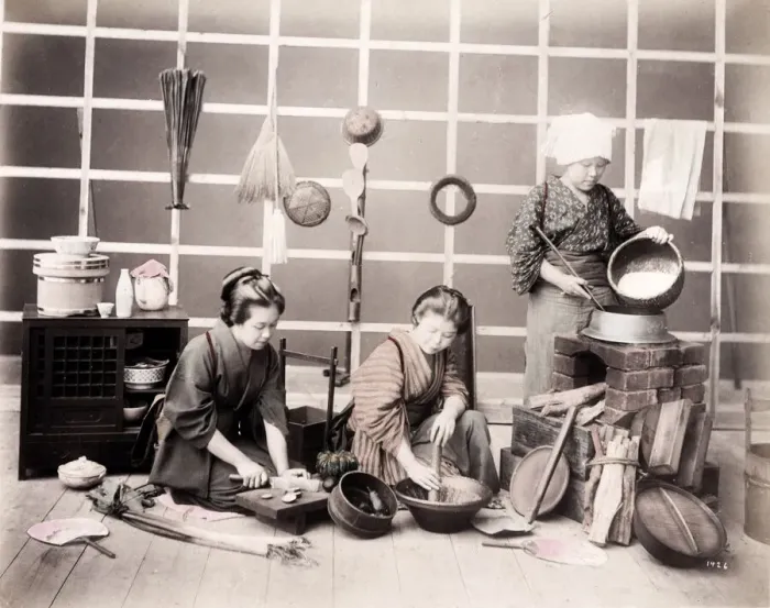 Framed Print : Late 19th century - young Japanese women preparing meal Framed Print : Late 19th century - young Japanese women preparing meal