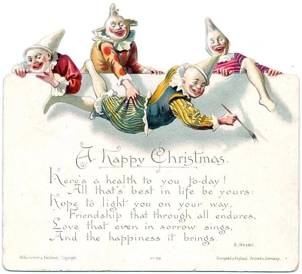Four laughing clowns on a Christmas card