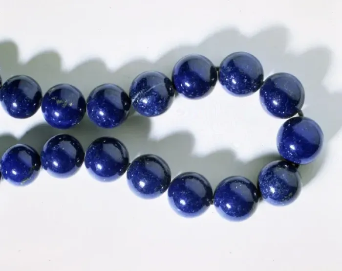 Framed Print : Lazurite. Necklace made from lazurite. Lazurite comprises of Framed Print : Lazurite. Necklace made from lazurite. Lazurite comprises of