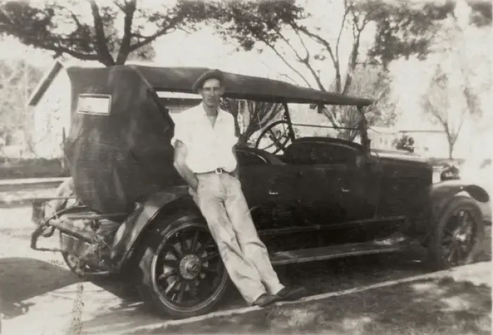 Framed Print : Leaning against his motor
